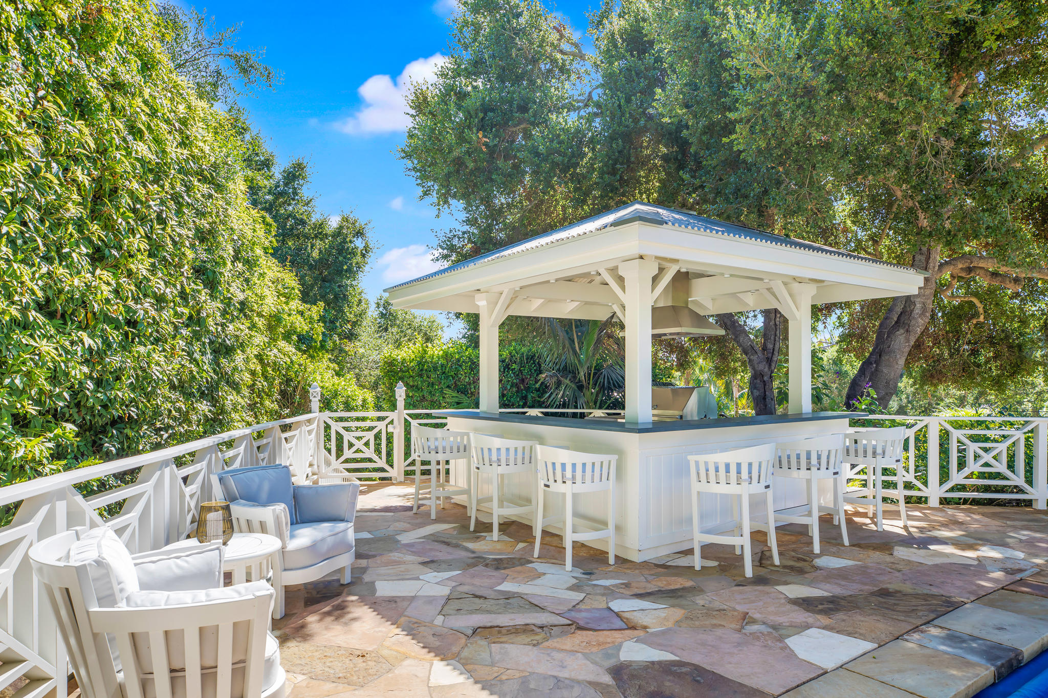 808 Riven Rock Road Santa Barbara, CA 93108 - Photo 25 of 44 a view of a chair and table in the patio