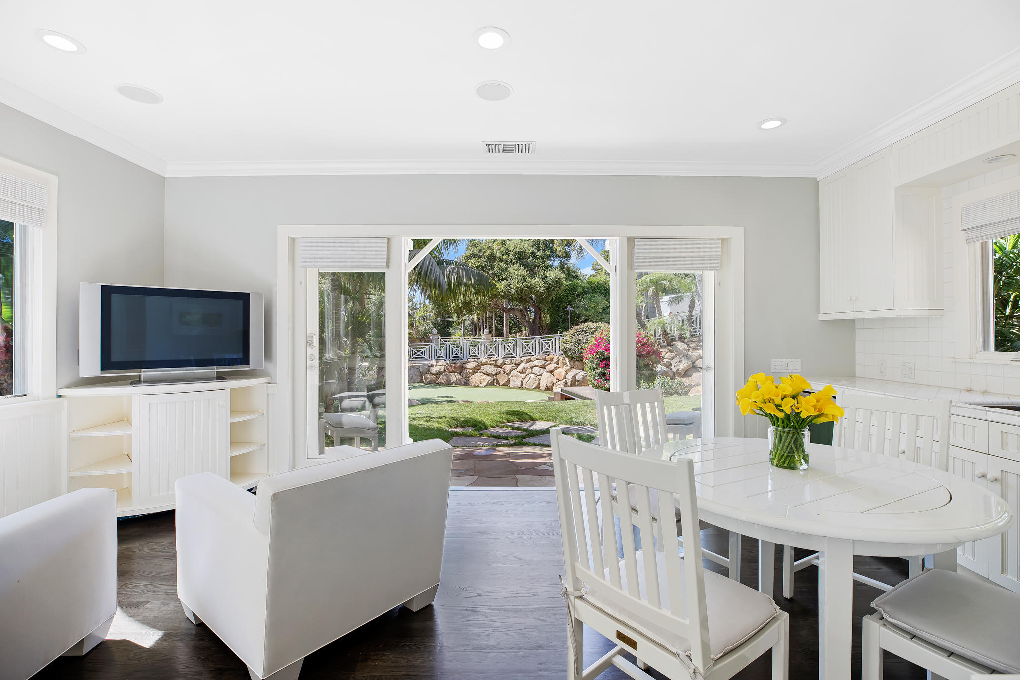 808 Riven Rock Road Santa Barbara, CA 93108 - Photo 36 of 44 a living room with furniture and a flat screen tv