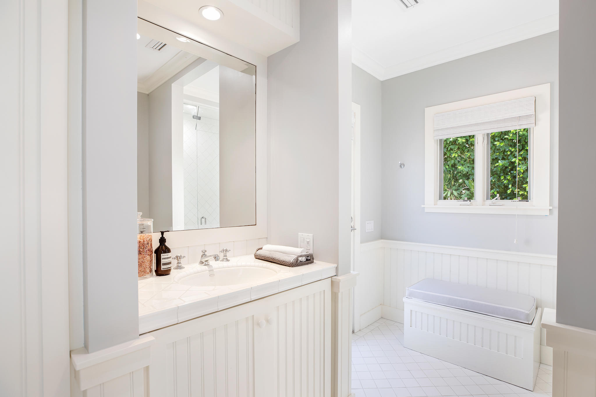 808 Riven Rock Road Santa Barbara, CA 93108 - Photo 38 of 44 a bathroom with a sink a toilet and a mirror
