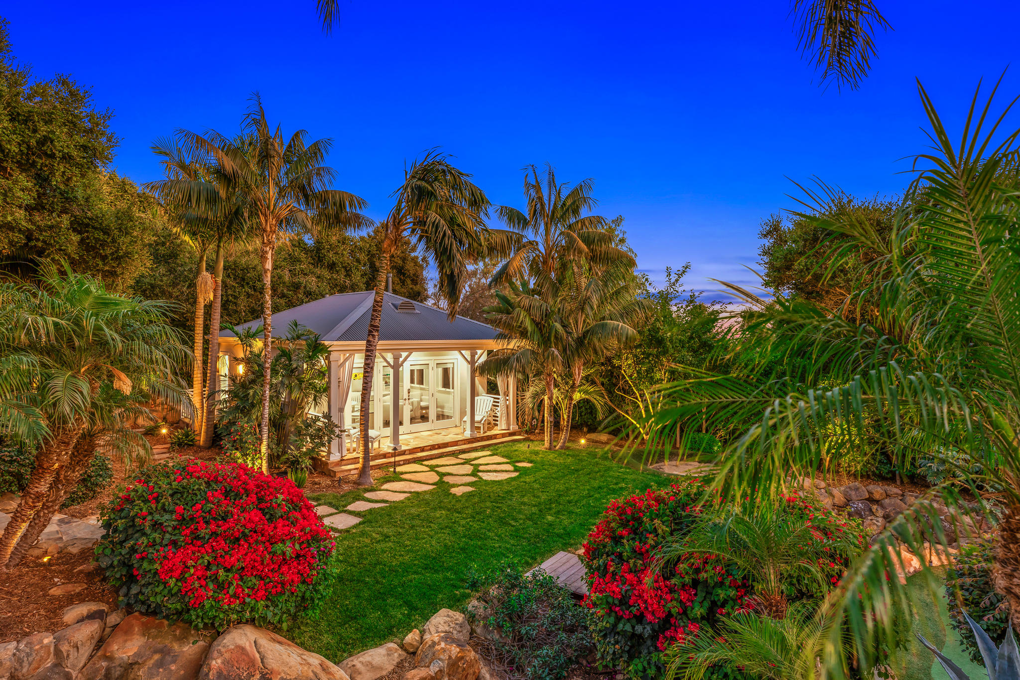 808 Riven Rock Road Santa Barbara, CA 93108 - Photo 41 of 44 a view of a house with a big yard and potted plants
