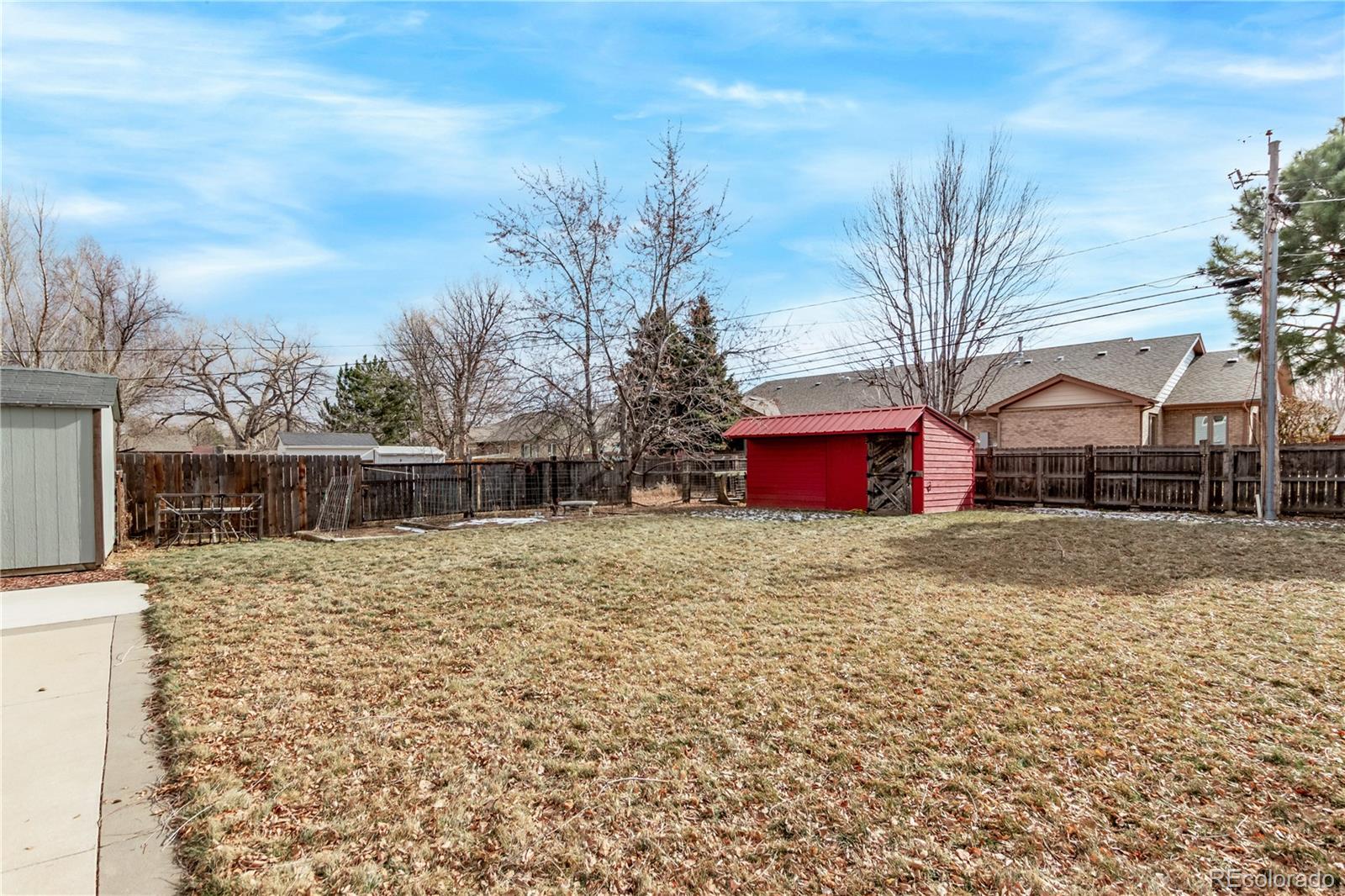 10640 West 46th Avenue Wheat Ridge, CO 80033 - Photo 33 of 46 a pathway of a house with a yard