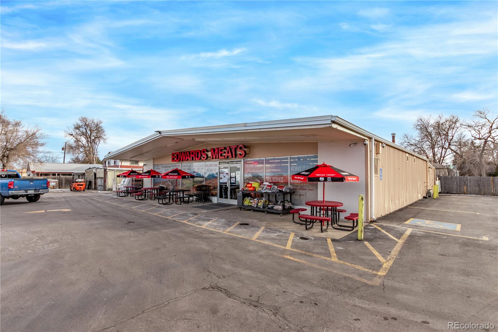 10640 West 46th Avenue Wheat Ridge, CO 80033 - Photo 34 of 46 a group of cars parked in front of a building