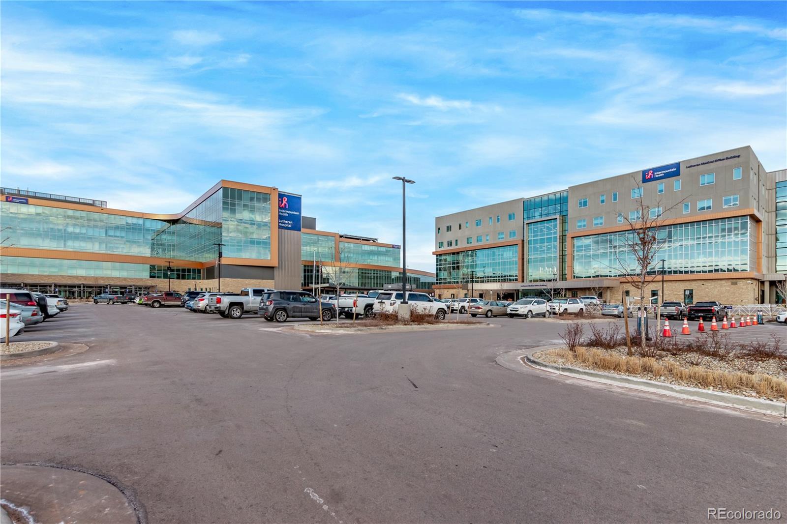 10640 West 46th Avenue Wheat Ridge, CO 80033 - Photo 39 of 46 a group of cars parked in front of a building
