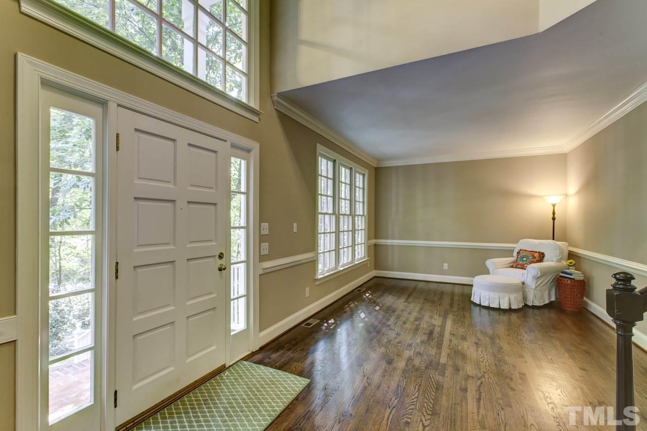 1709 Percheron Place Raleigh, NC 27613 - Photo 6 of 25 a bedroom with furniture and a window