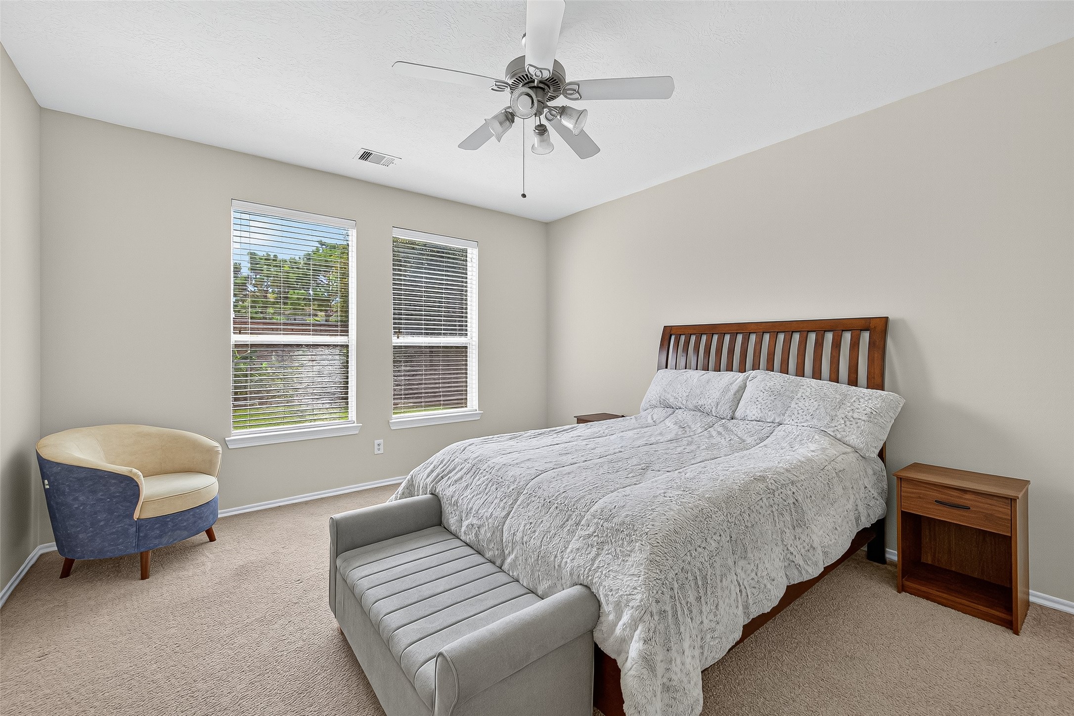 6230 Hollydale Ridge Lane Katy, TX 77494 - Photo 19 of 41 a bedroom with a bed and a couch