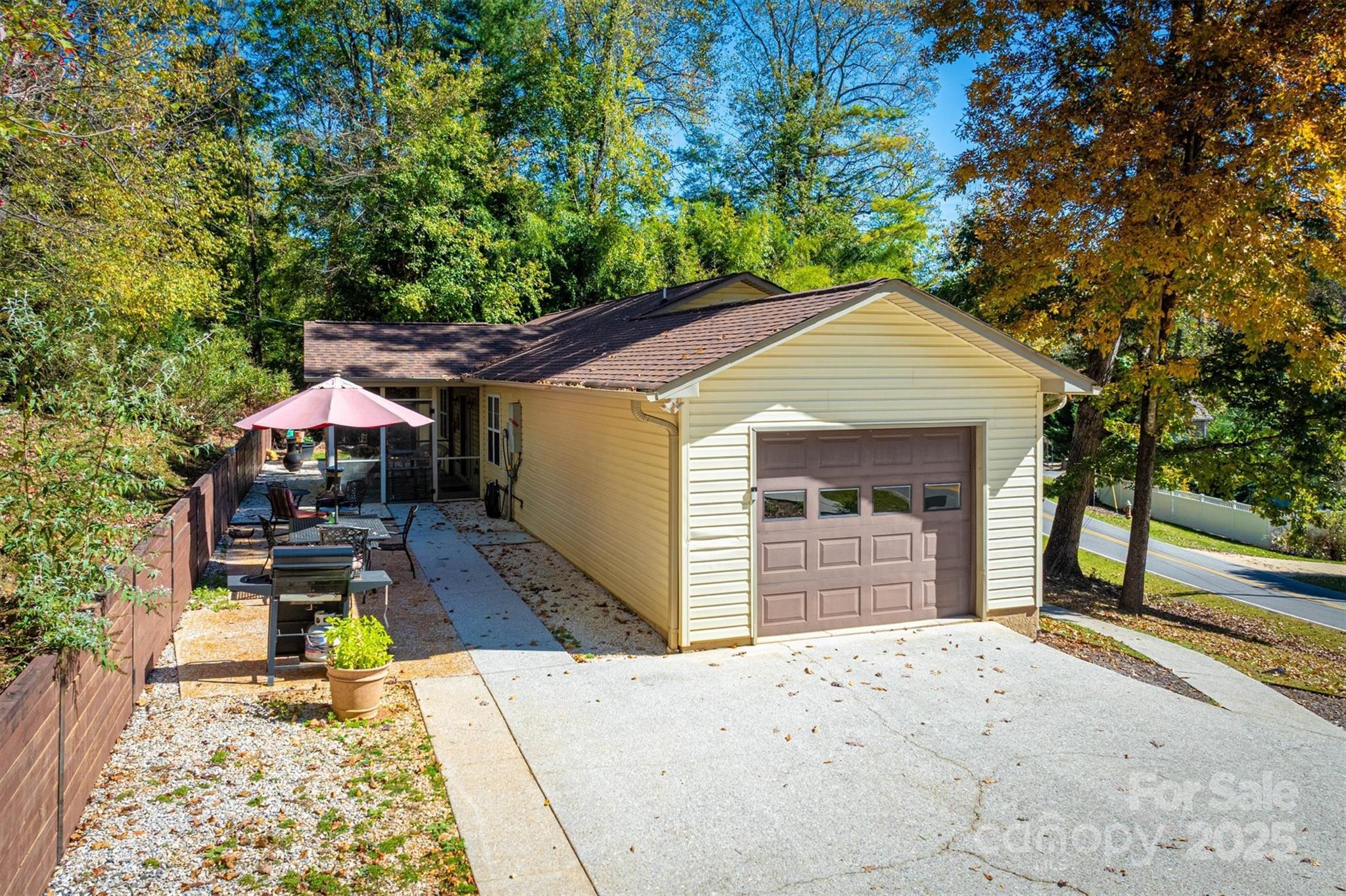 187 Yancey Road Marion, NC 28752 - Photo 8 of 36 a front view of a house with a yard