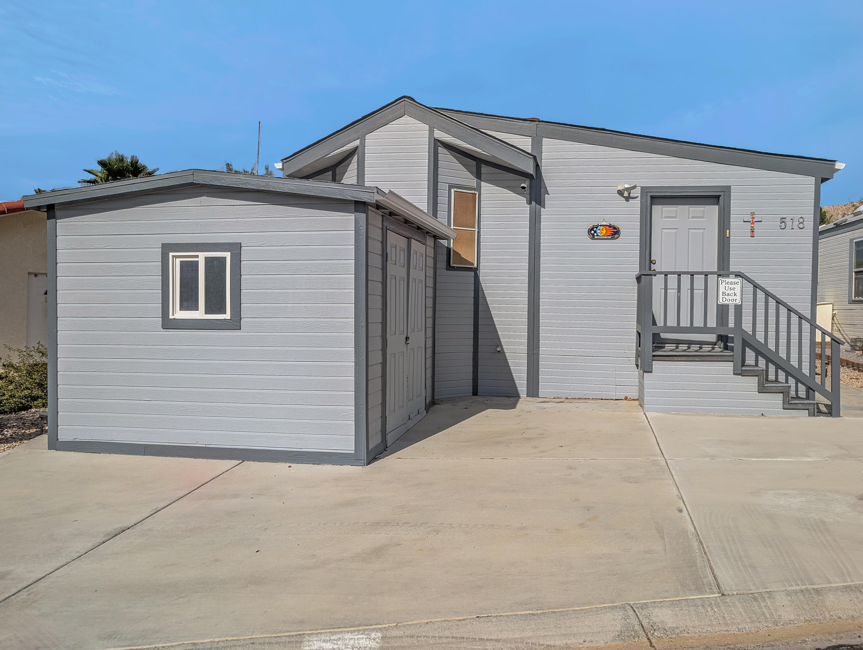 a front view of a house with garage