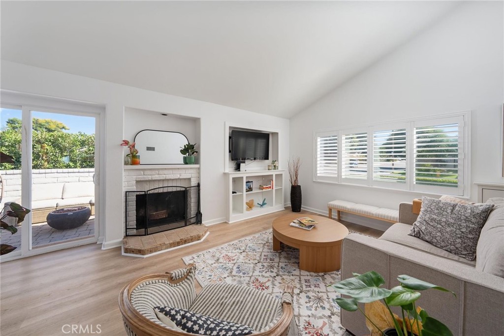 25302 Vía Ramon Valencia, CA 91355 - Photo 9 of 40 Living Room with built in & fireplace