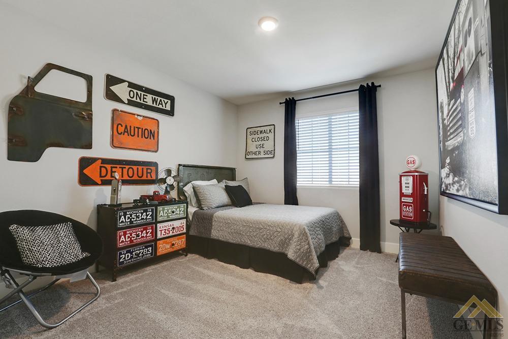 Undisclosed Address Bakersfield, CA 93311 - Photo 20 of 28 a bedroom with bed and a window