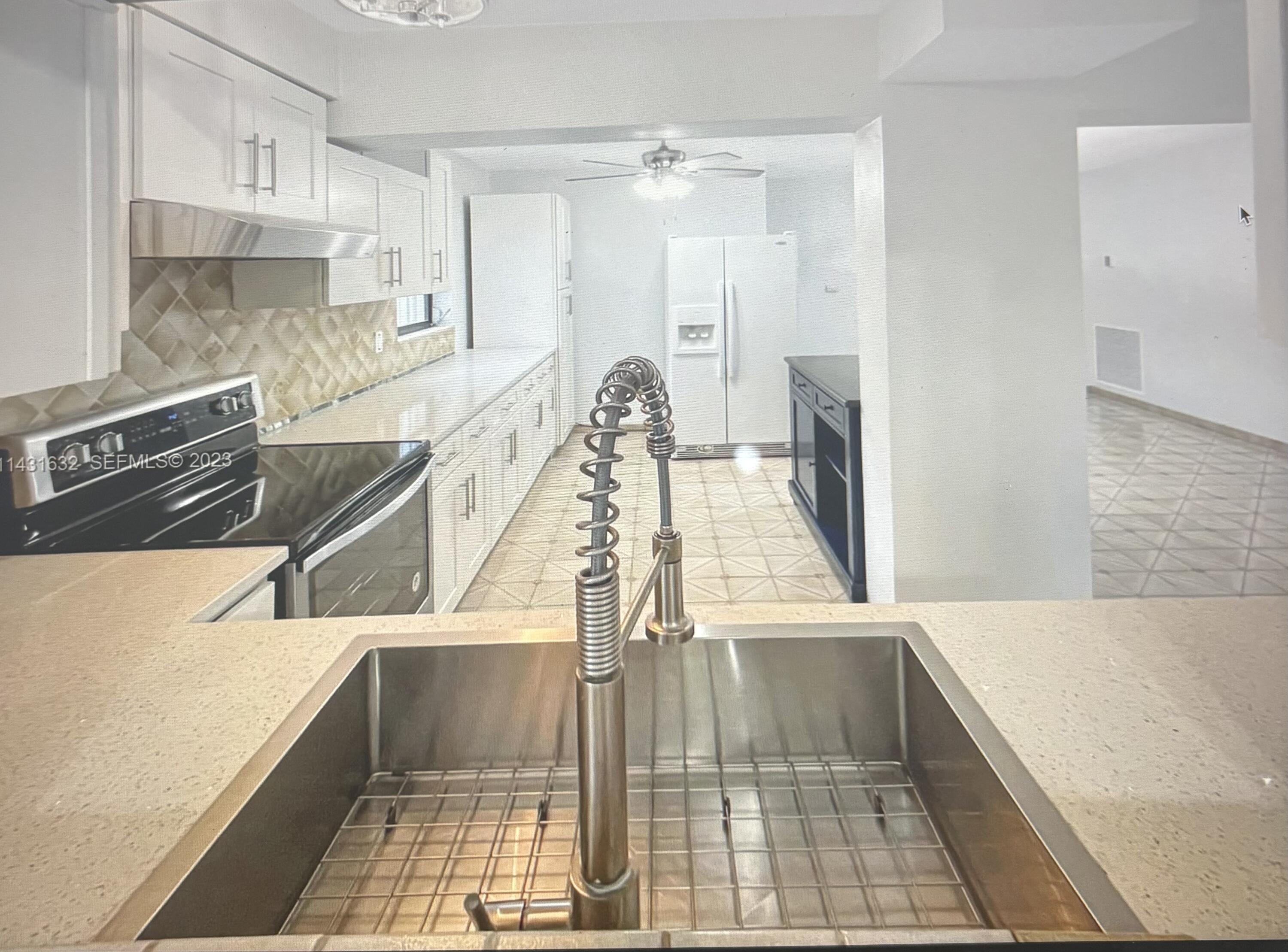 3813 Northeast 16th Terrace Pompano Beach, FL 33064 - Photo 2 of 12 IMG_6144