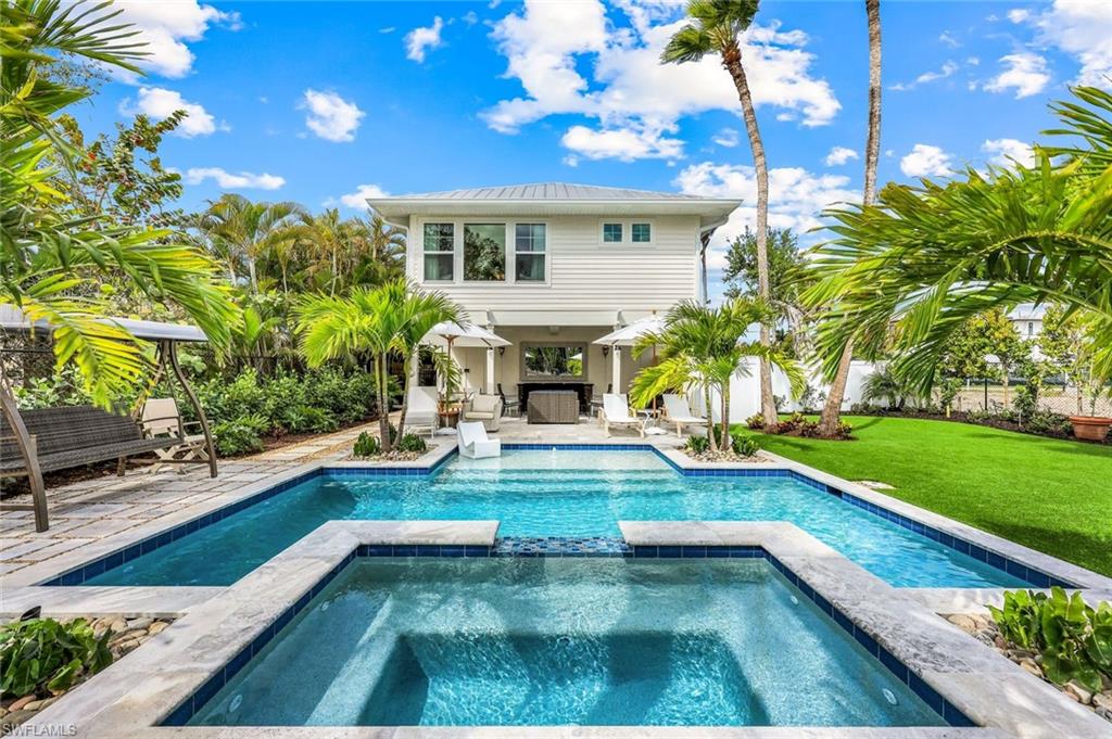 a view of a house with swimming pool