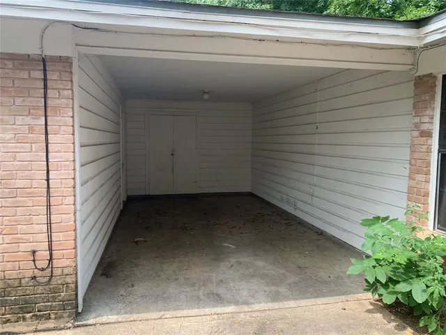 a view of cabinets with wooden floor