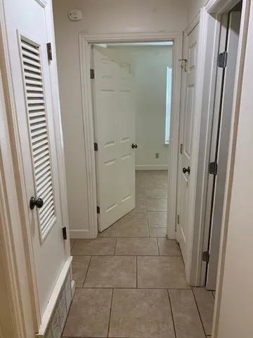 a bathroom with a sink toilet and mirror
