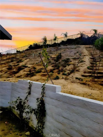 a view of living room with furniture and flat screen tv