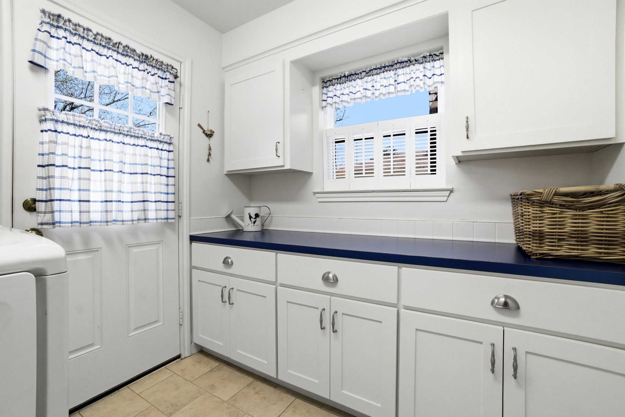 218 Tree Trunk Drive Spring, TX 77388 - Photo 32 of 40 Laundry room with cabinets.