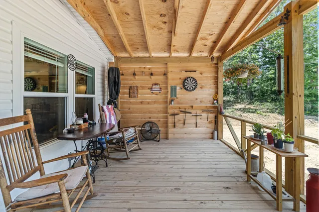 a view of a wooden fence and a floor to ceiling window