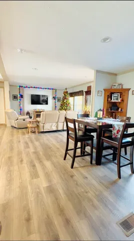 a view of a dining room with furniture