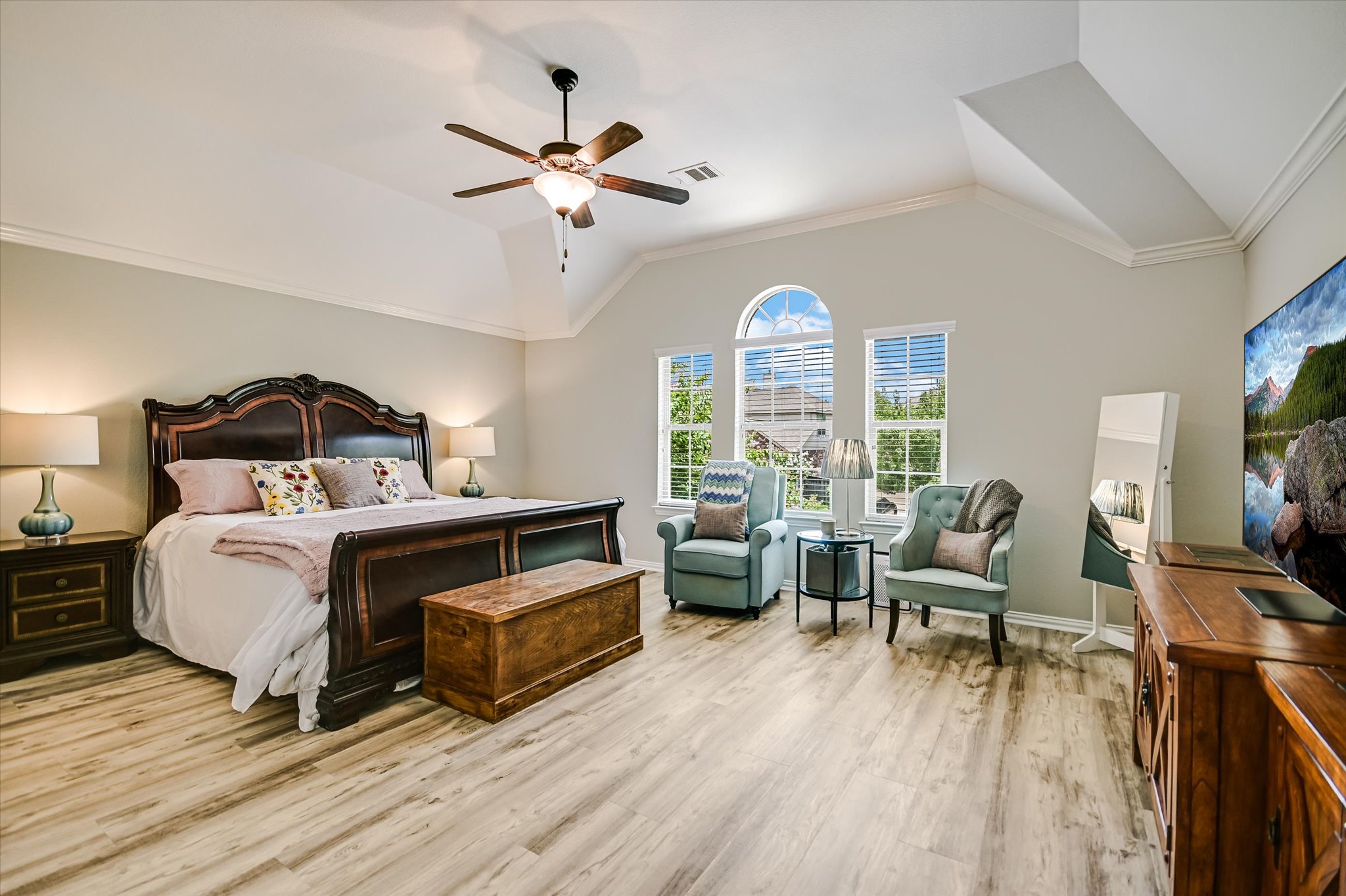 4623 Chestnut Meadows Bend Georgetown, TX 78626 - Photo 18 of 30 a bedroom with a bed and wooden floor