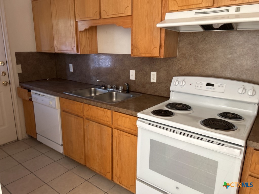 4005 Doraine Court, Unit A Killeen, TX 76549 - Photo 3 of 9 a utility room with dryer and washer