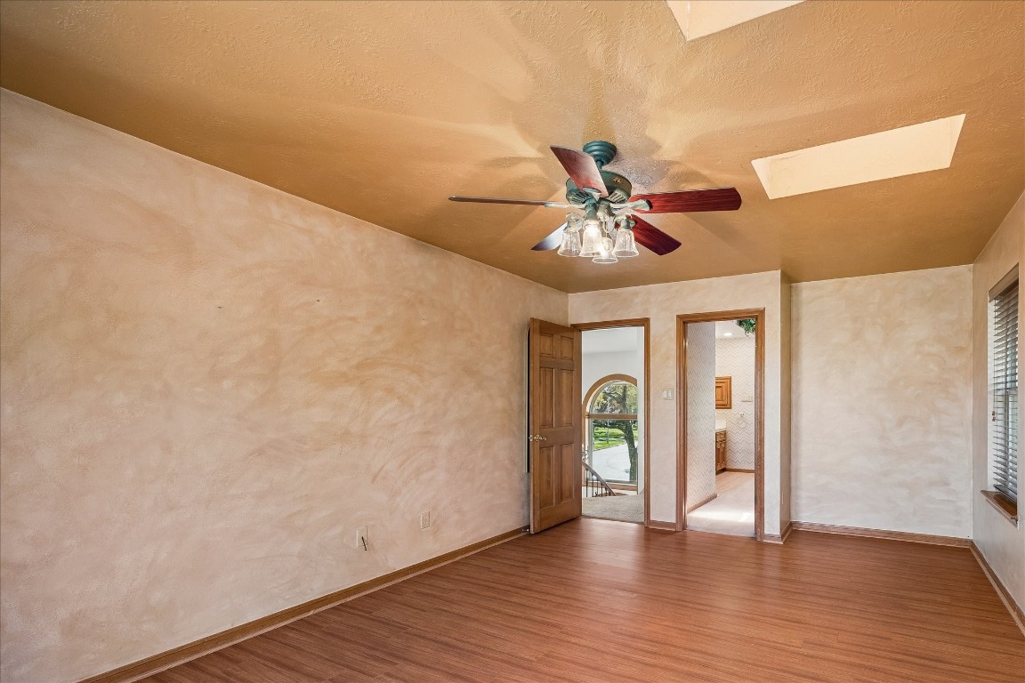 1835 Raintree Circle Seabrook, TX 77586 - Photo 18 of 50 a view of an empty room with wooden floor
