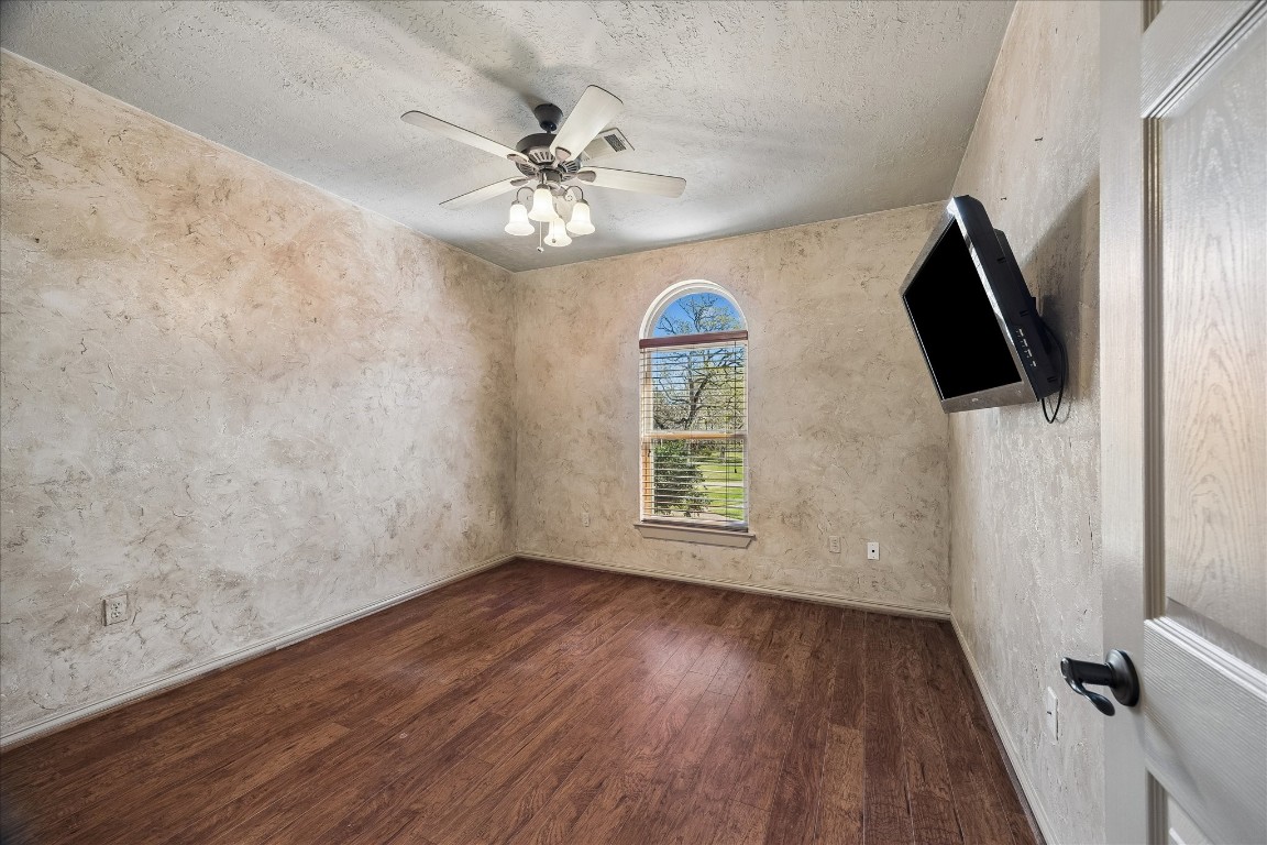 1835 Raintree Circle Seabrook, TX 77586 - Photo 28 of 50 wooden floor in an empty room with a window