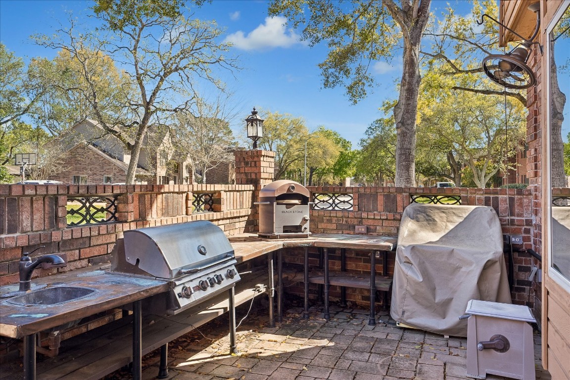 1835 Raintree Circle Seabrook, TX 77586 - Photo 31 of 50 a view of a patio with iron fence