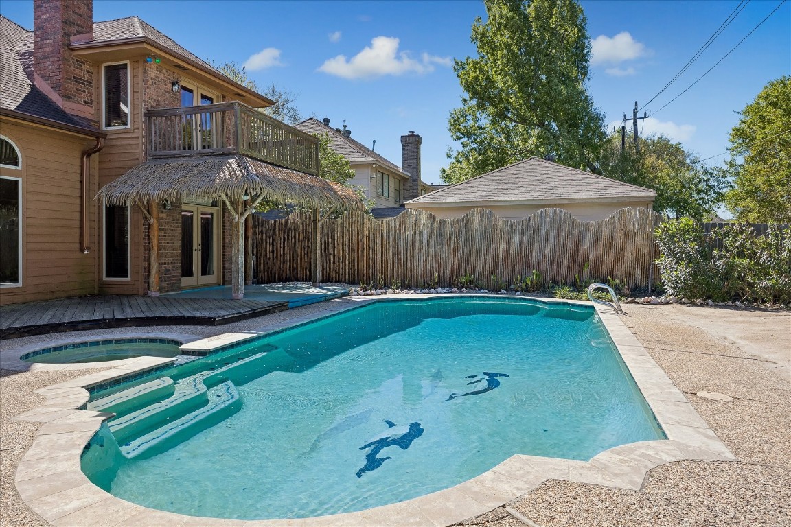 1835 Raintree Circle Seabrook, TX 77586 - Photo 34 of 50 Notice the dolphins engraved on the pool bottom,