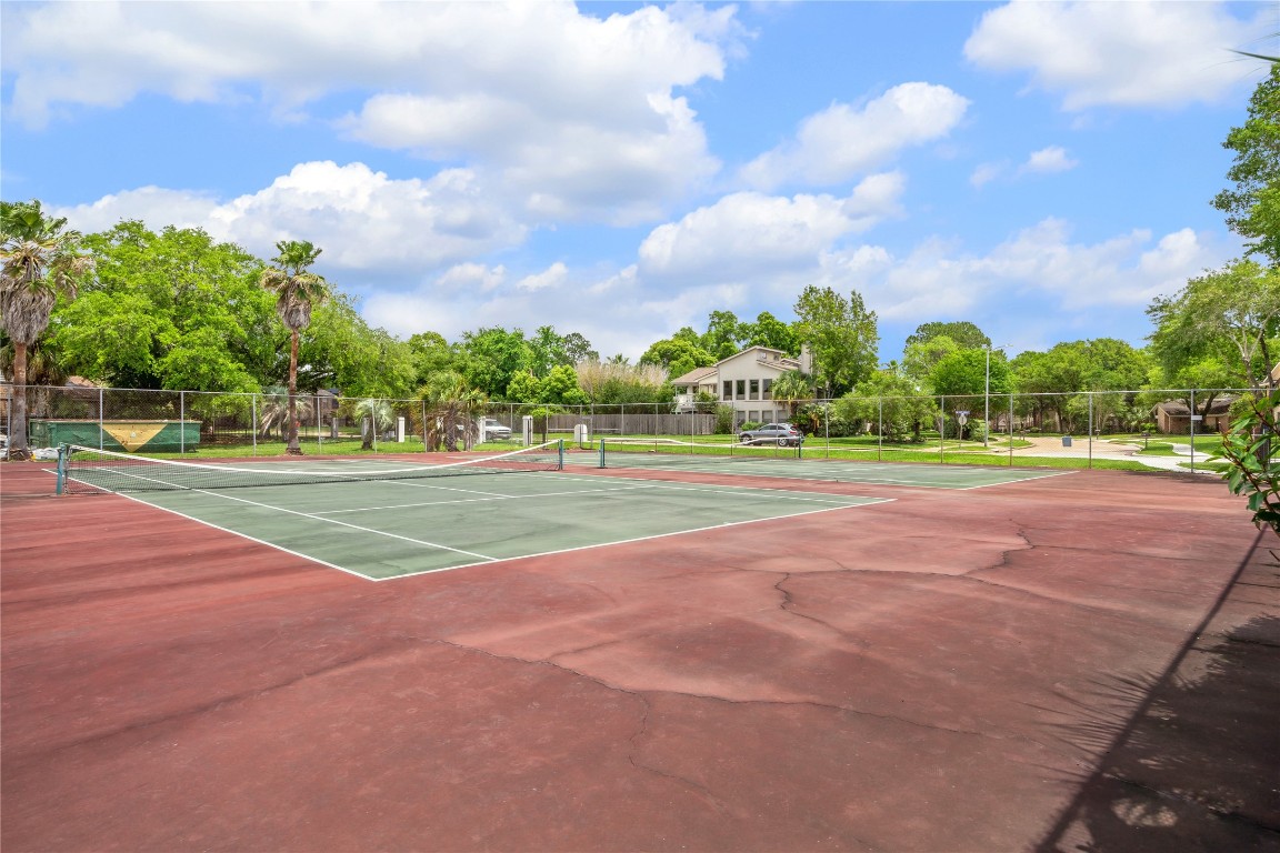 1835 Raintree Circle Seabrook, TX 77586 - Photo 49 of 50 a view of a playground and basketball court