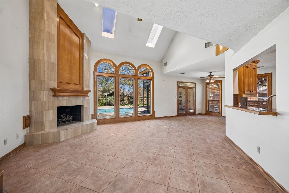 1835 Raintree Circle Seabrook, TX 77586 - Photo 5 of 50 a view of an entryway with a fireplace and a window