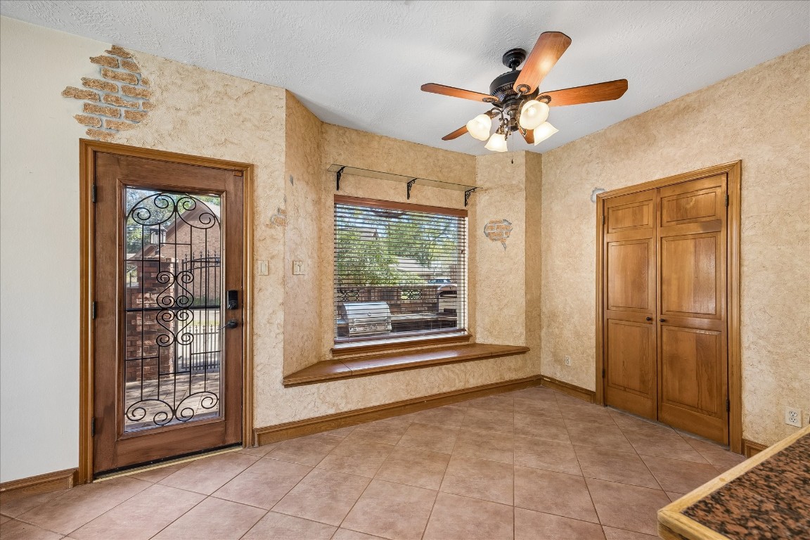 1835 Raintree Circle Seabrook, TX 77586 - Photo 7 of 50 a view of a livingroom with a ceiling fan and window