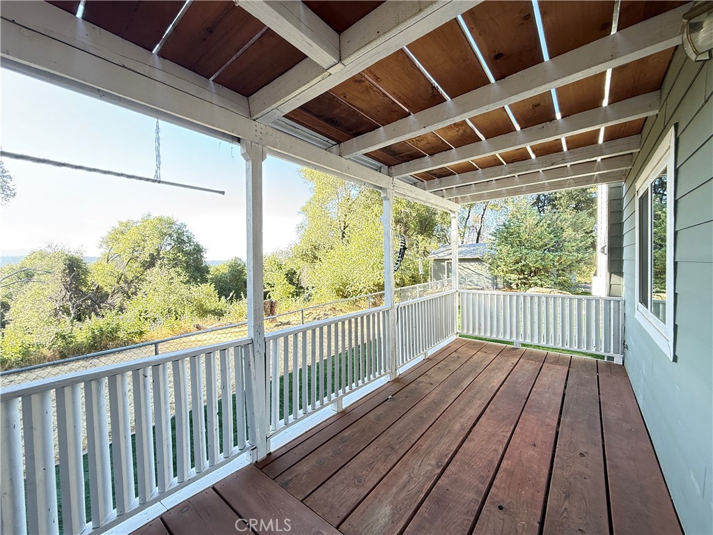 5452 Carleton Road Mariposa, CA 95338 - Photo 15 of 57 a view of a balcony with wooden floor