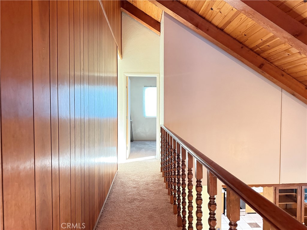 5452 Carleton Road Mariposa, CA 95338 - Photo 41 of 57 a view of a hallway with wooden floor and staircase