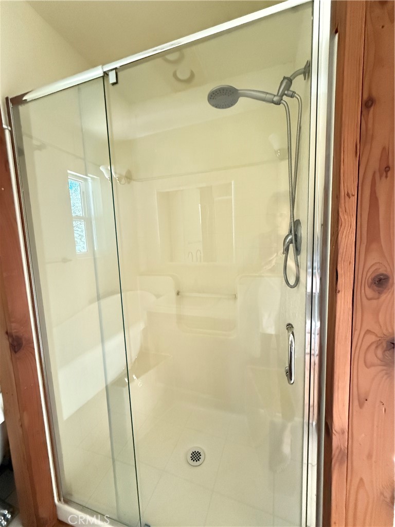 5452 Carleton Road Mariposa, CA 95338 - Photo 47 of 57 a bathroom with a glass door shower