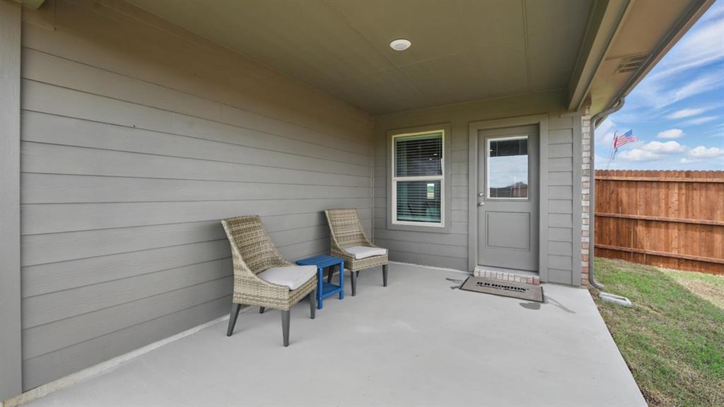 1645 Tin Roof Road Krum, TX 76249 - Photo 35 of 36 a view of a two chairs in the room