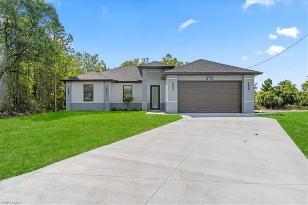 $299,900 | 373 Selkirk Avenue East, Lehigh Acres, FL 33974