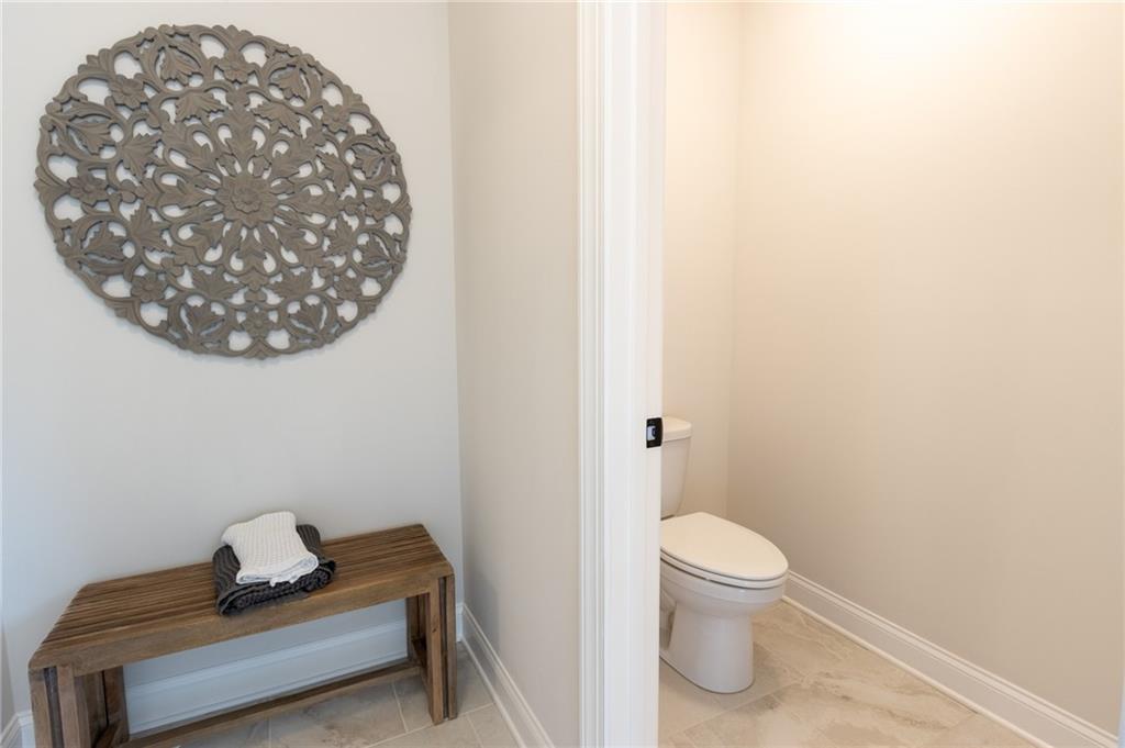 560 Calgary Downs Drive Winder, GA 30680 - Photo 29 of 37 a bathroom with a toilet