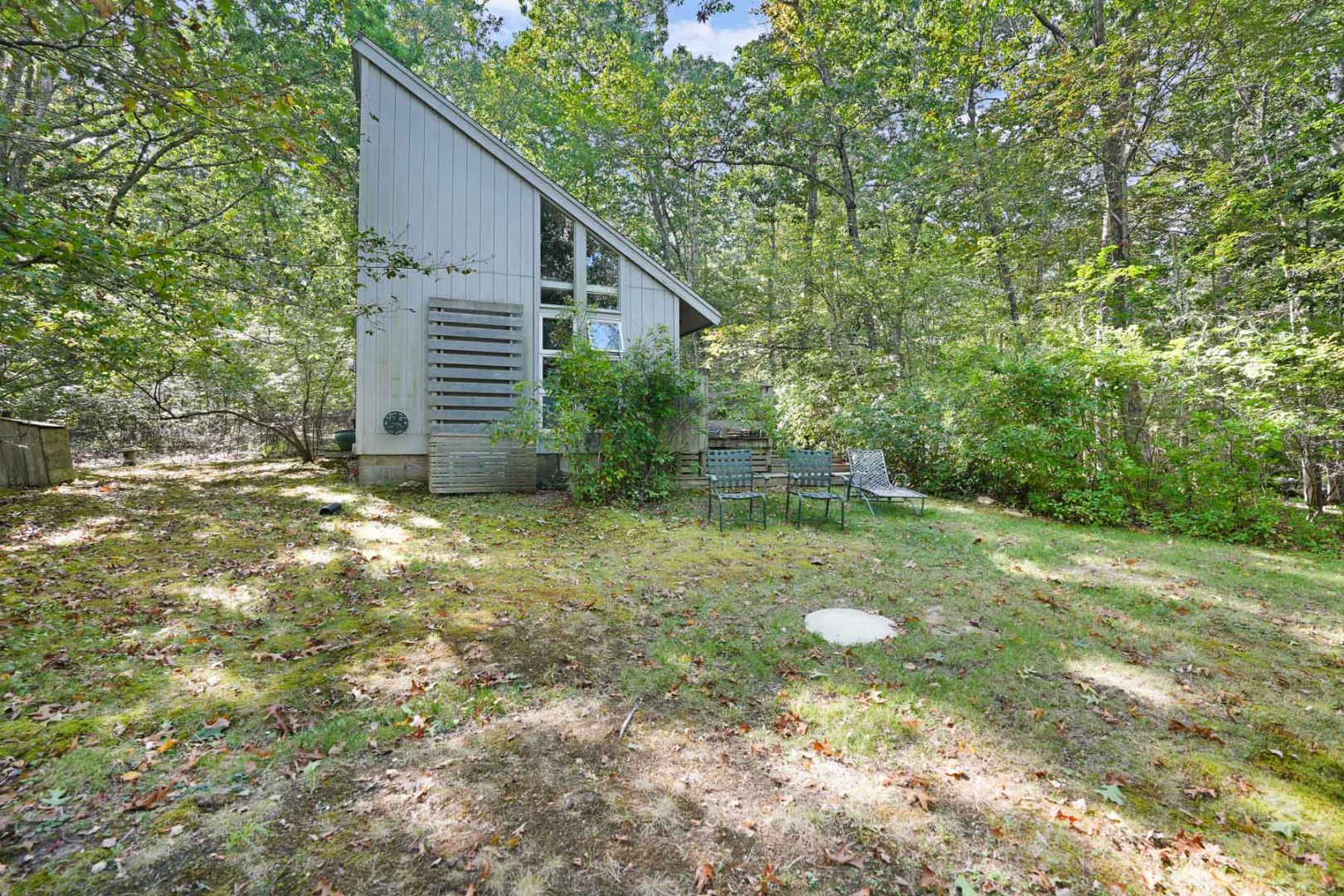 25 Fulling Mill Road Chilmark, MA 02535 - Photo 21 of 31 a backyard of a house with lots of green space