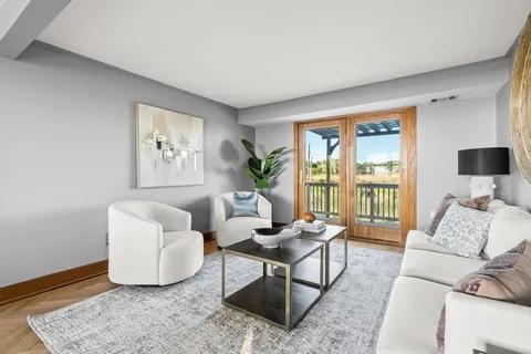 a living room with furniture and a couch