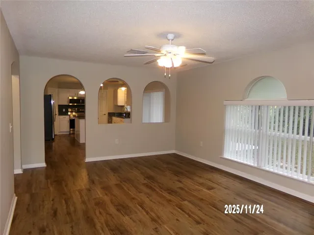 a view of a livingroom with wooden floor