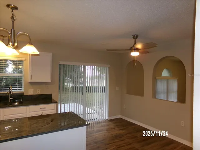 a view of a livingroom with furniture