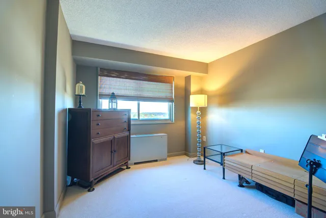 a room with furniture and window