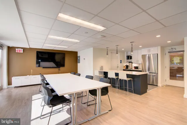 a view of a park with sitting area