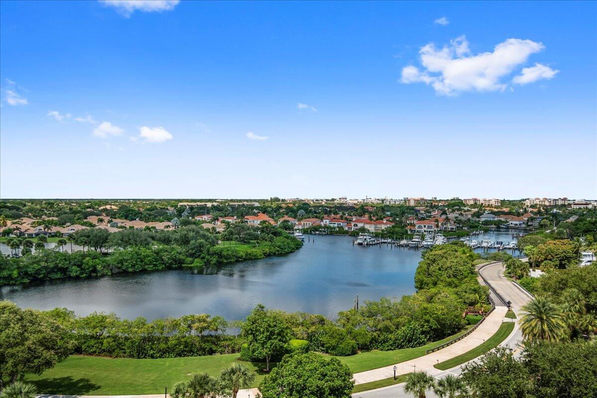 3322 Casseekey Island Road, Unit 901 Jupiter, FL 33477 - Photo 36 of 68 a view of a lake with a city