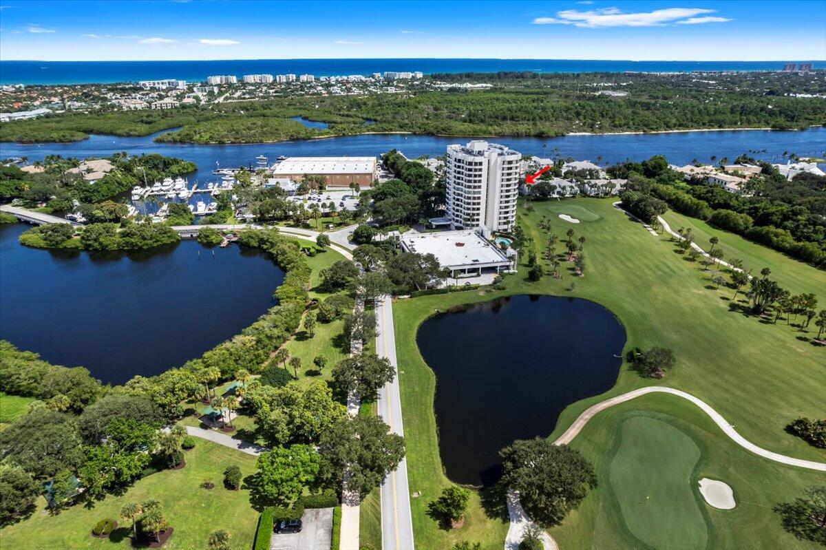 3322 Casseekey Island Road, Unit 901 Jupiter, FL 33477 - Photo 46 of 68 a view of a city with lots of lake