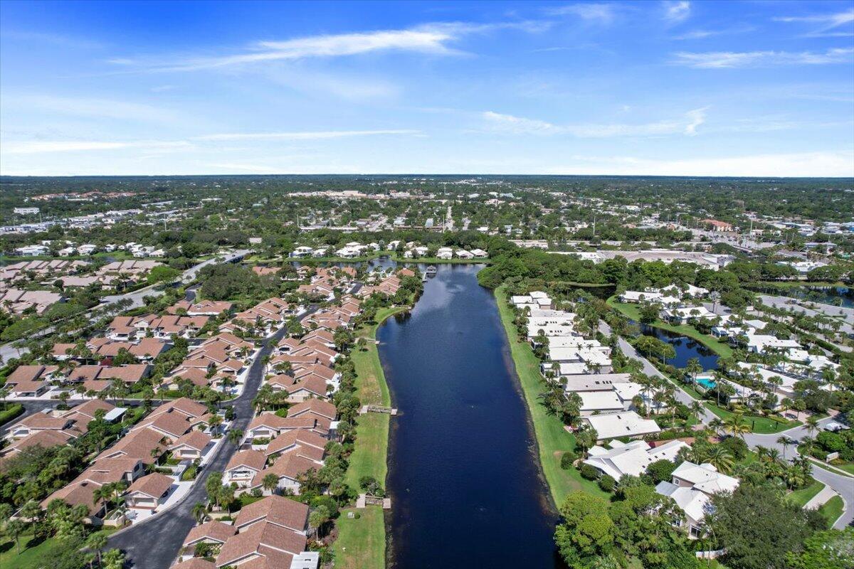 3322 Casseekey Island Road, Unit 901 Jupiter, FL 33477 - Photo 56 of 68 an aerial view of city and lake
