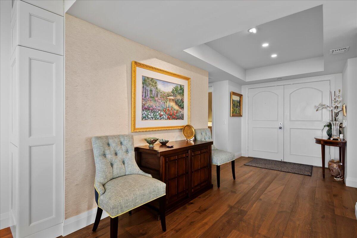 3322 Casseekey Island Road, Unit 901 Jupiter, FL 33477 - Photo 6 of 68 a living room with furniture and a wooden floor