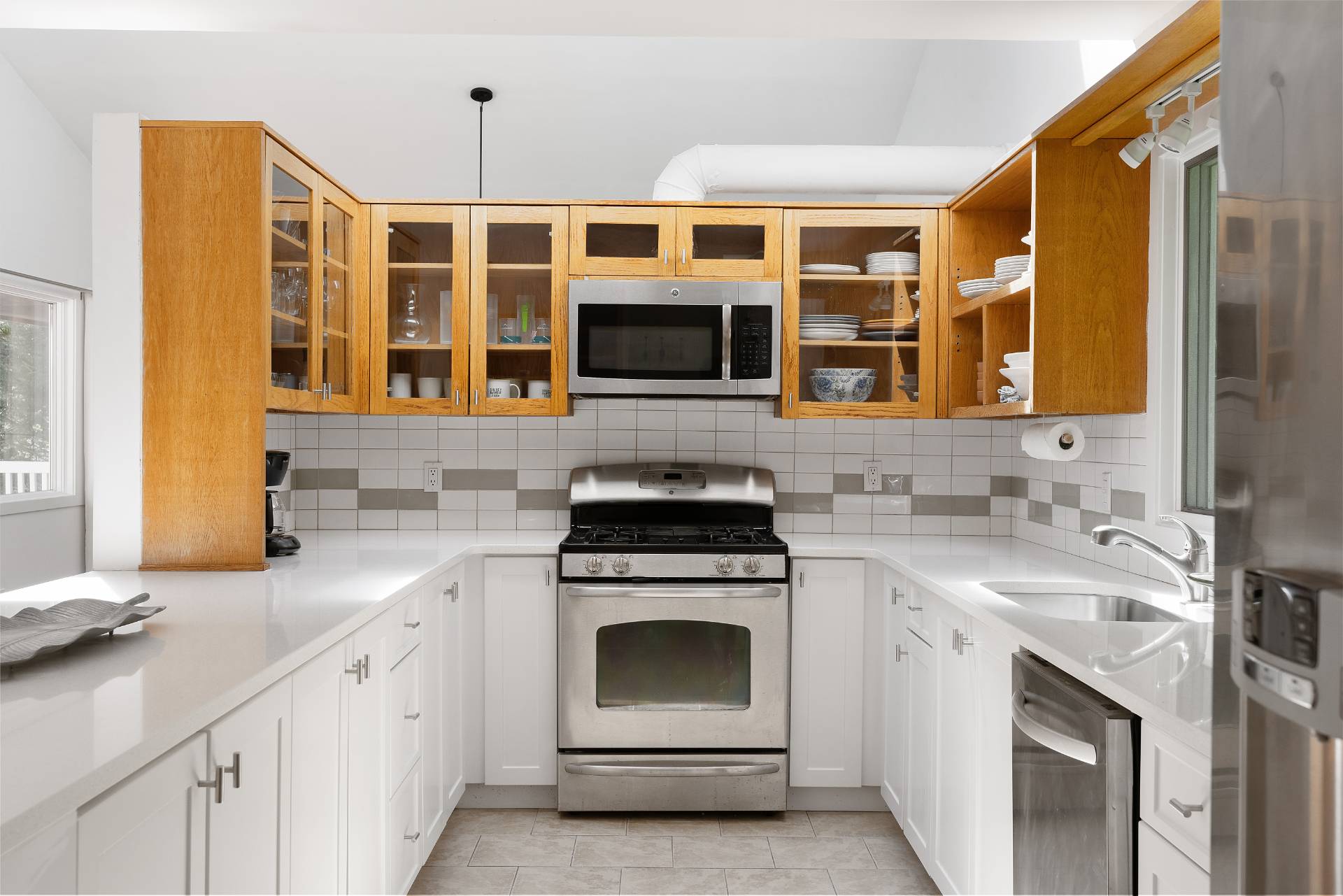 11 Wagon Lane East Hampton, NY 11937 - Photo 3 of 17 a kitchen with stainless steel appliances granite countertop a stove and a sink