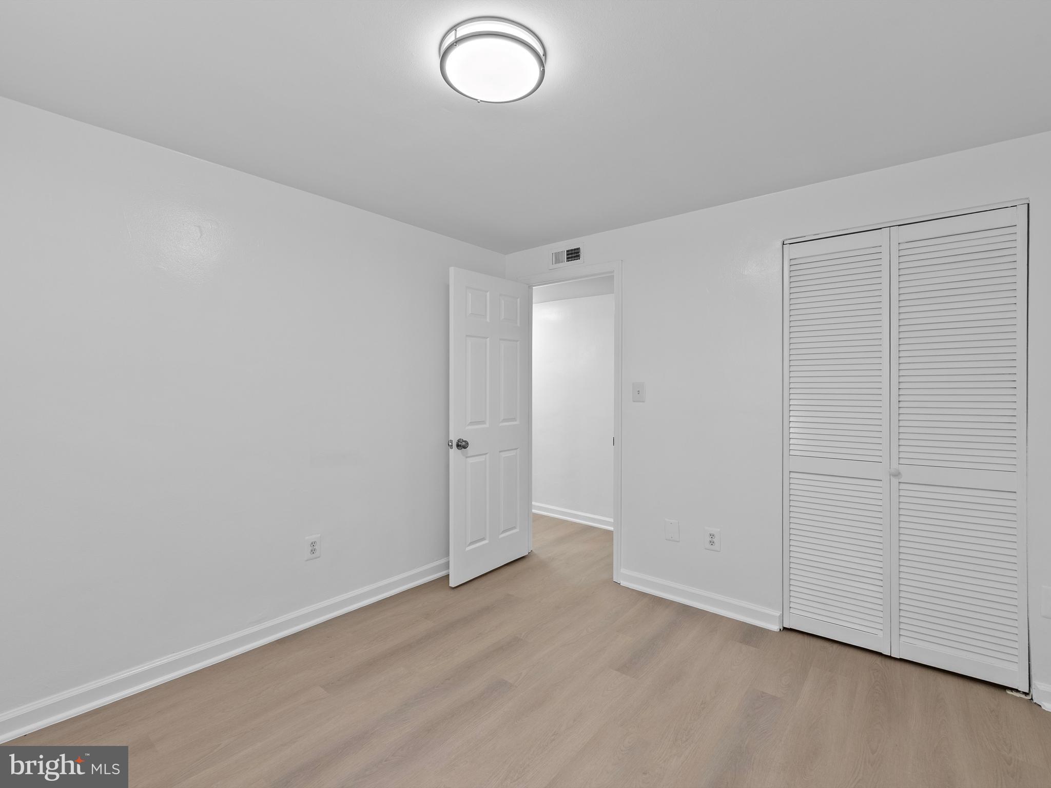708 South Arlington Mill Drive, Unit 104 Arlington, VA 22204 - Photo 13 of 24 a view of an empty room