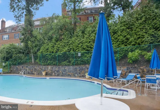 a view of a chairs and table in the patio