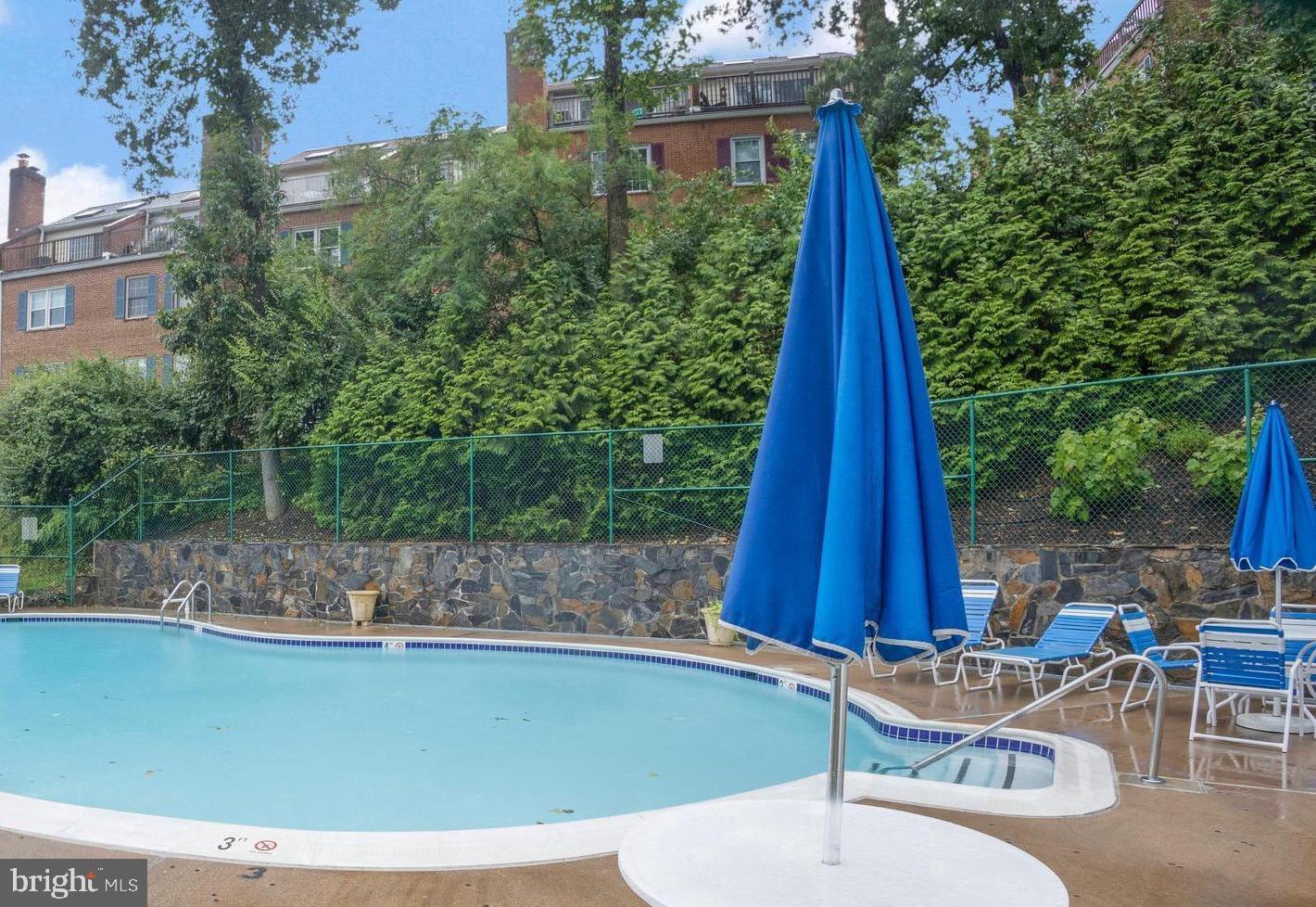 708 South Arlington Mill Drive, Unit 104 Arlington, VA 22204 - Photo 21 of 24 a view of a chairs and table in the patio